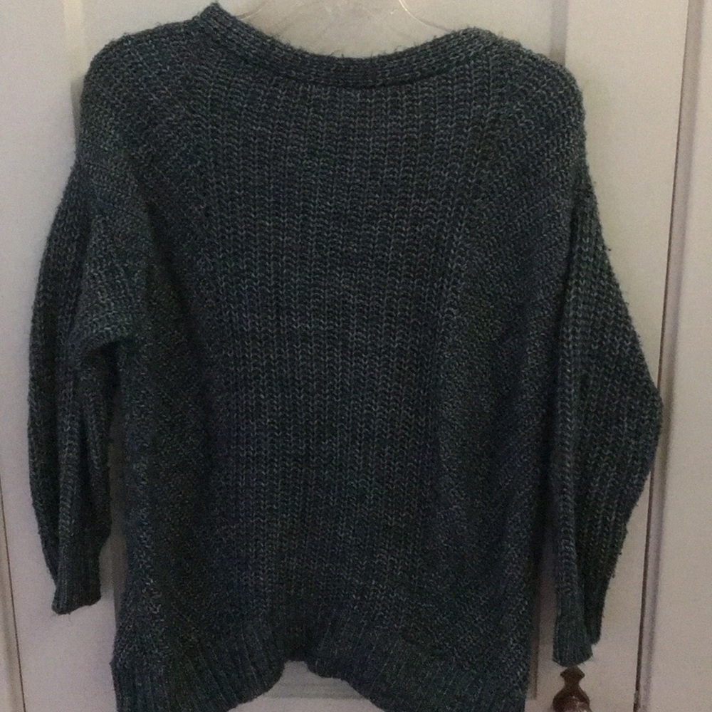 Knit sweater.